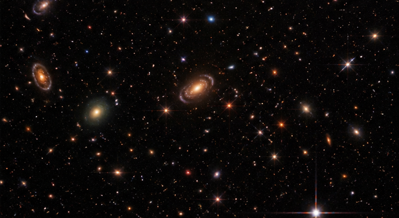 AI-genereret illustration af fjerne galakser og stjerner i et mørkt univers